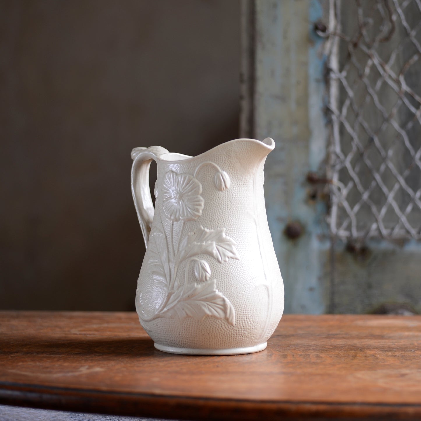 Poppy relief Creamware Jug