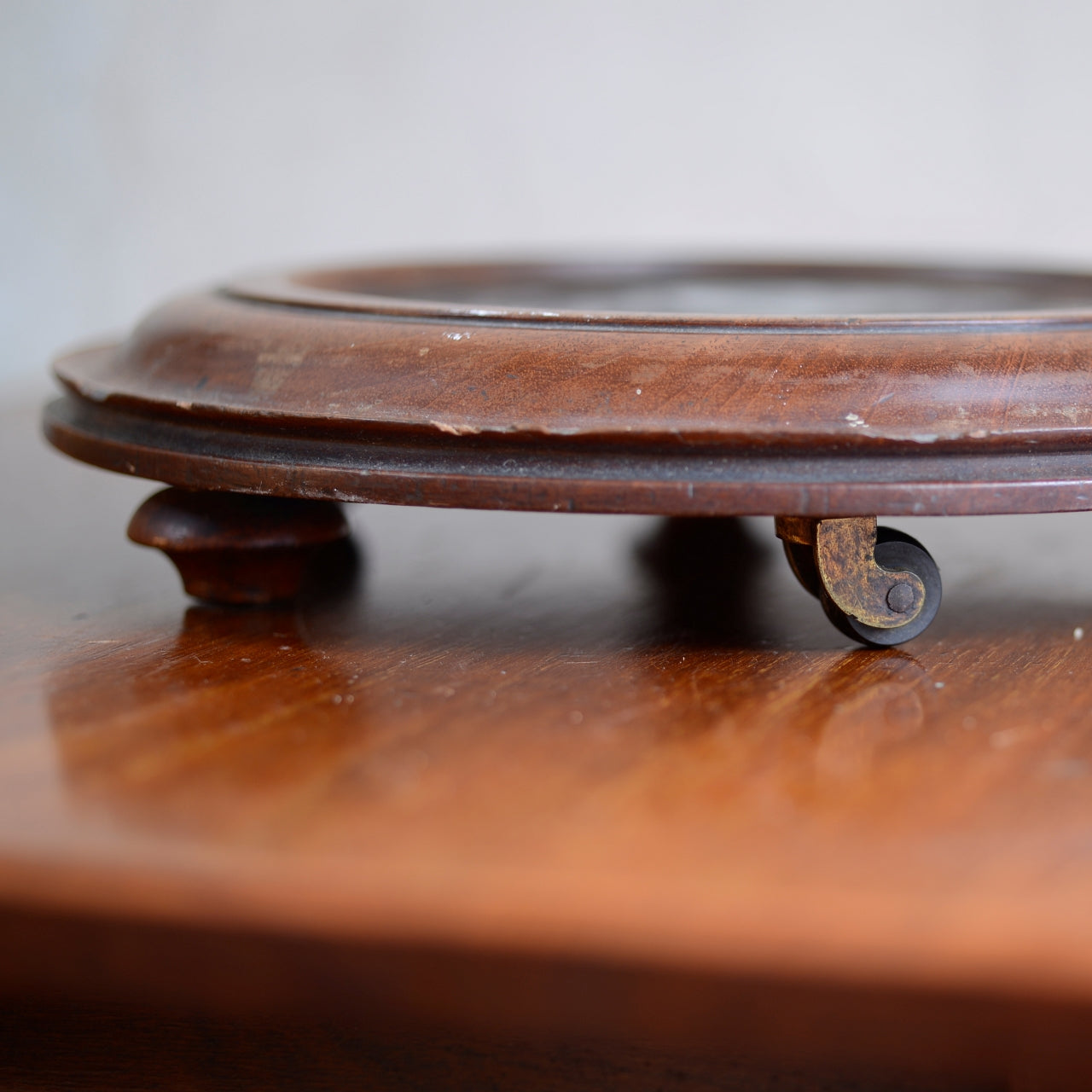 Unusual Scottish Tiled Trivet or Coaster with Castors