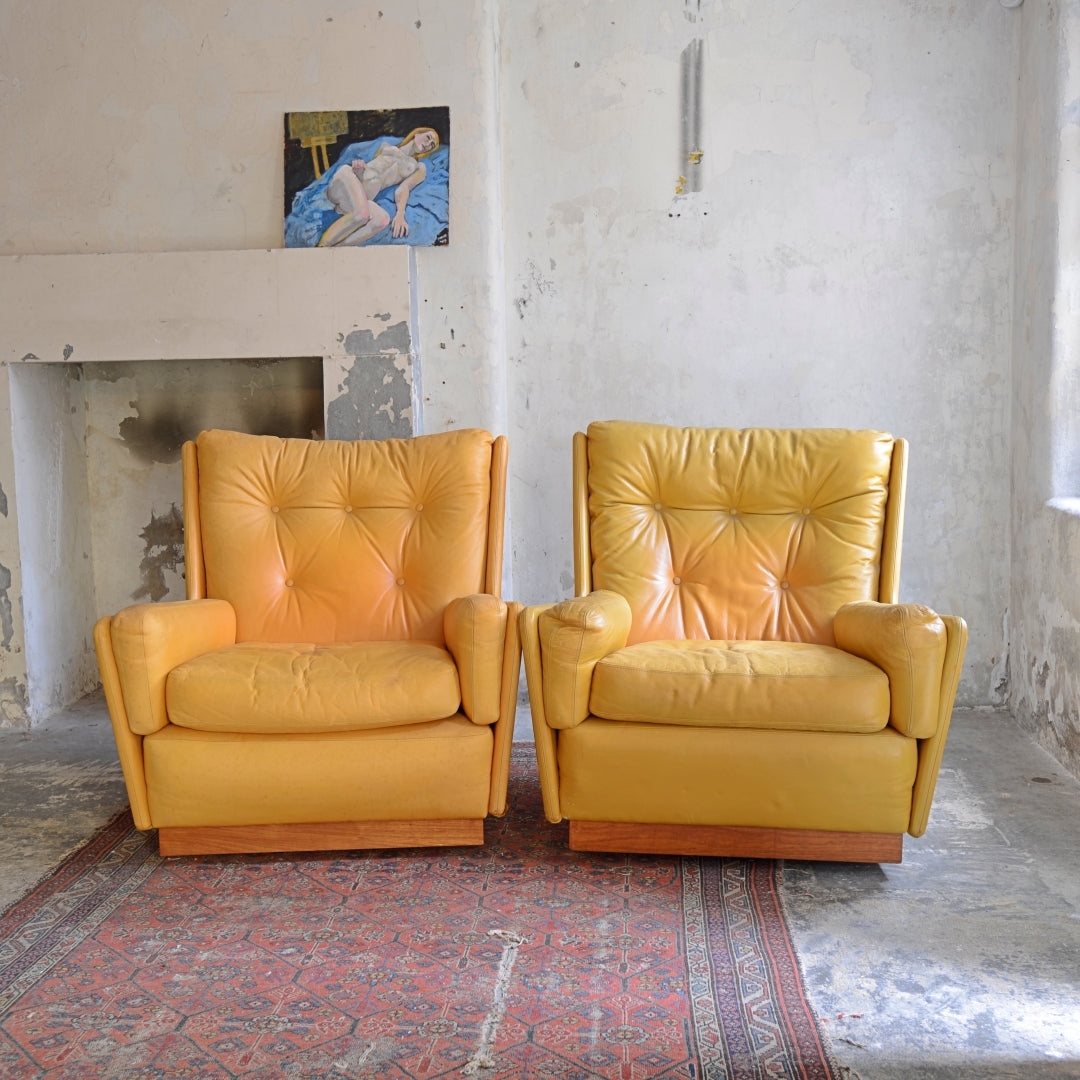 Pair of Leather Swivel Chairs