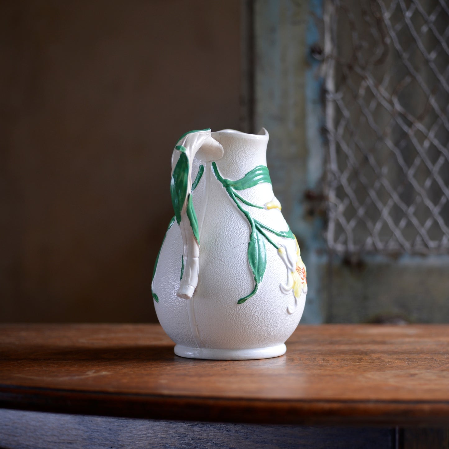 Parian ware Floral relief with hand coloured highlights