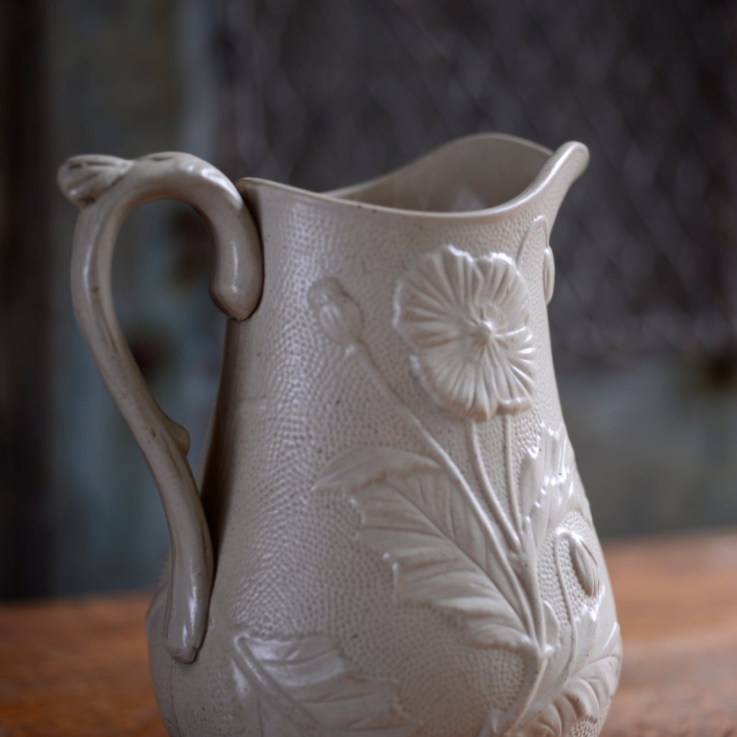 Poppy relief Creamware Jug