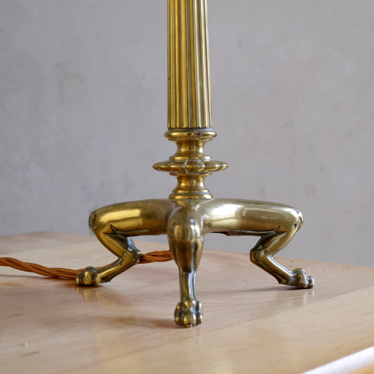 Antique Brass Column Table Lamp, raised on three paw feet