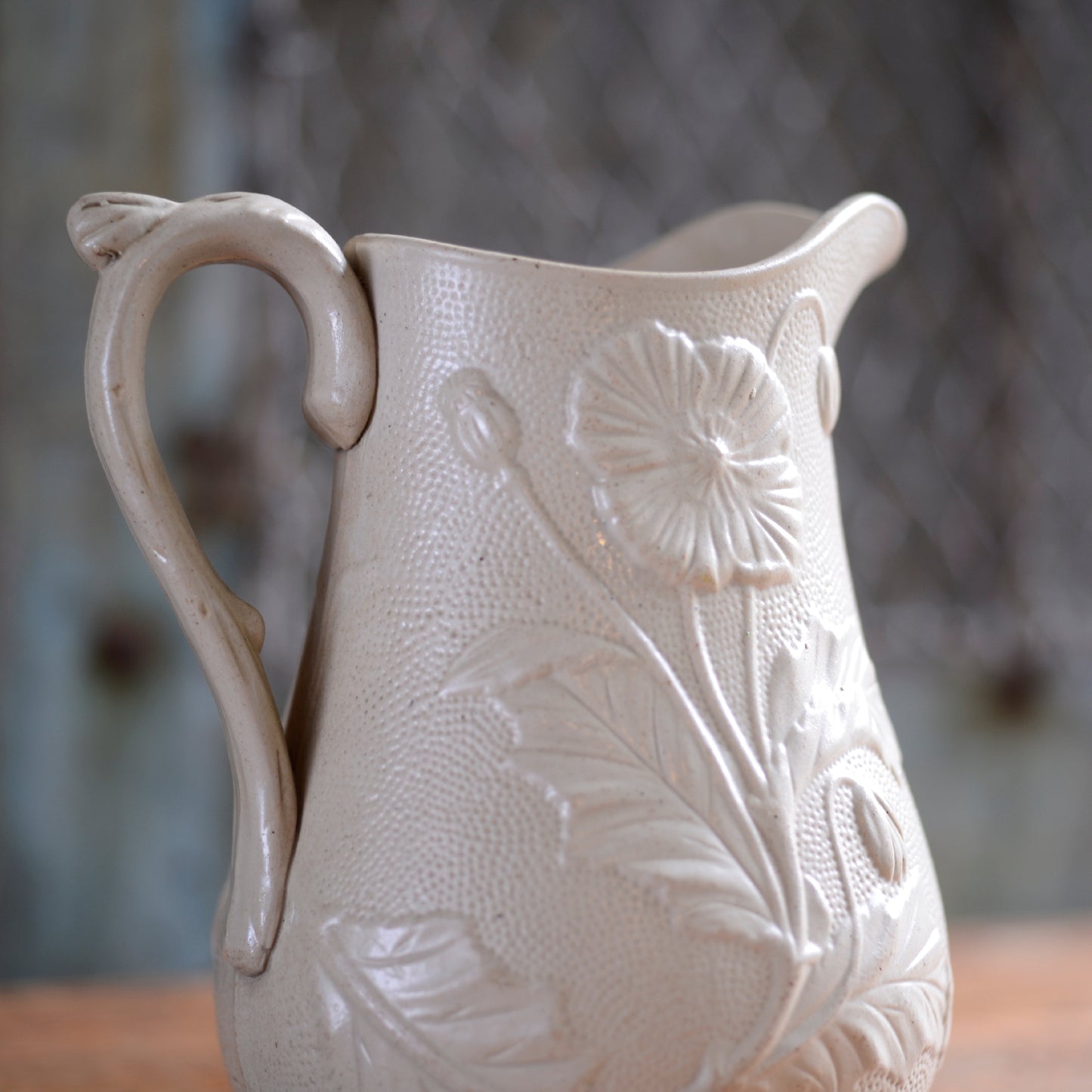 Poppy relief Creamware Jug