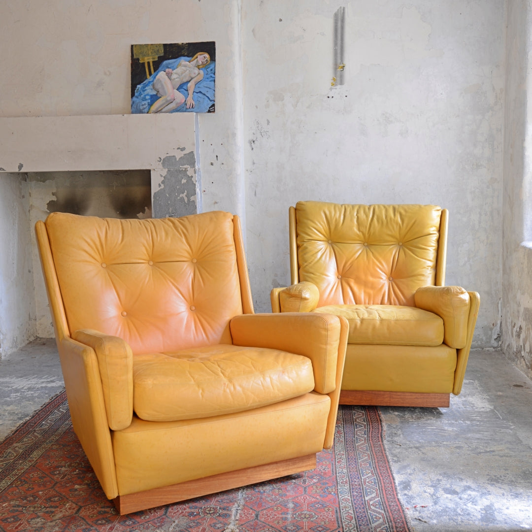 Pair of Leather Swivel Chairs