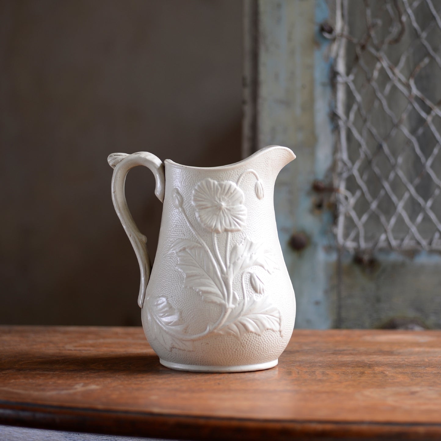 Poppy relief Creamware Jug